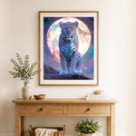 Finished cosmic moon leopard cross stitch artwork displayed as home decor