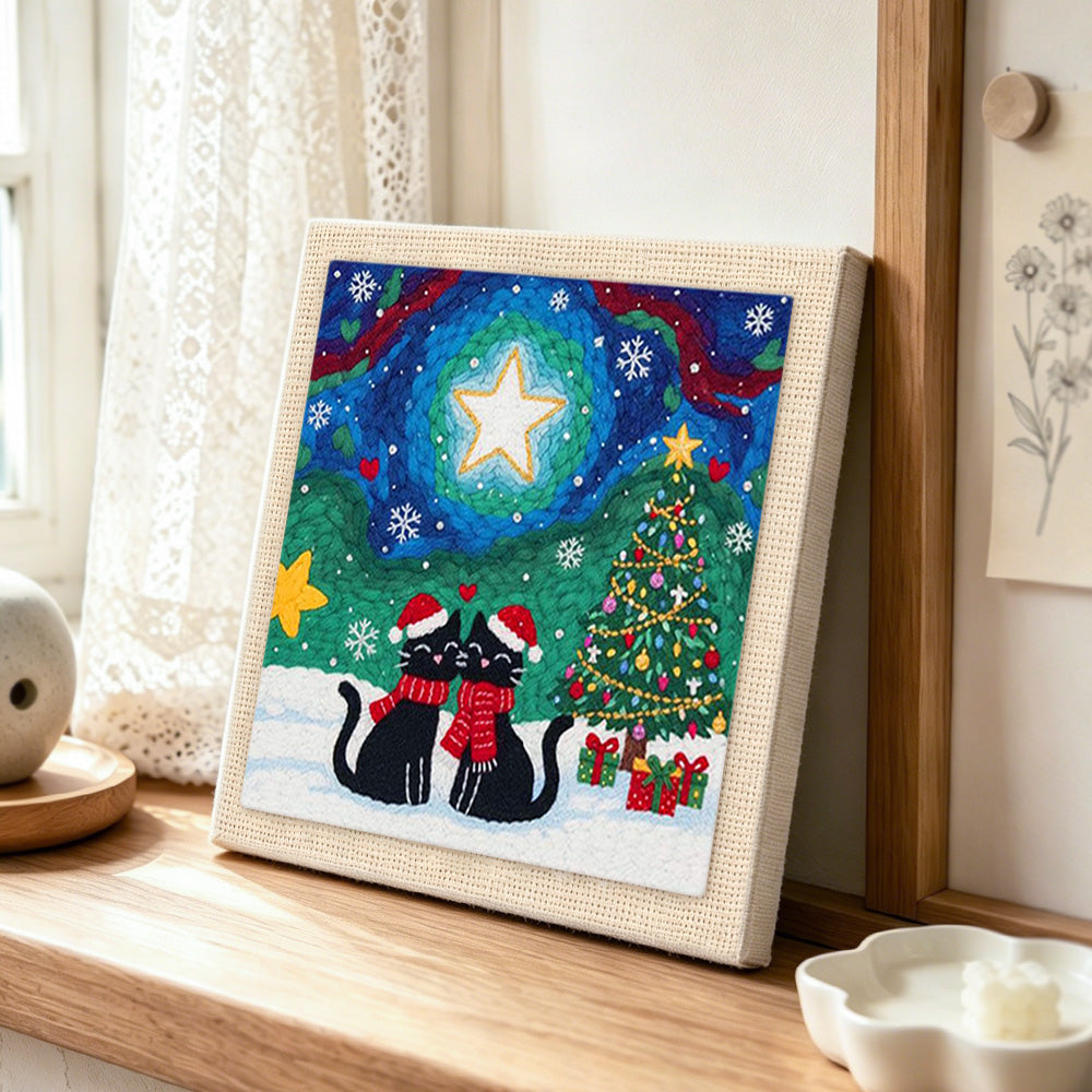 Couple black cats xmas punch needle artwork displayed on a table