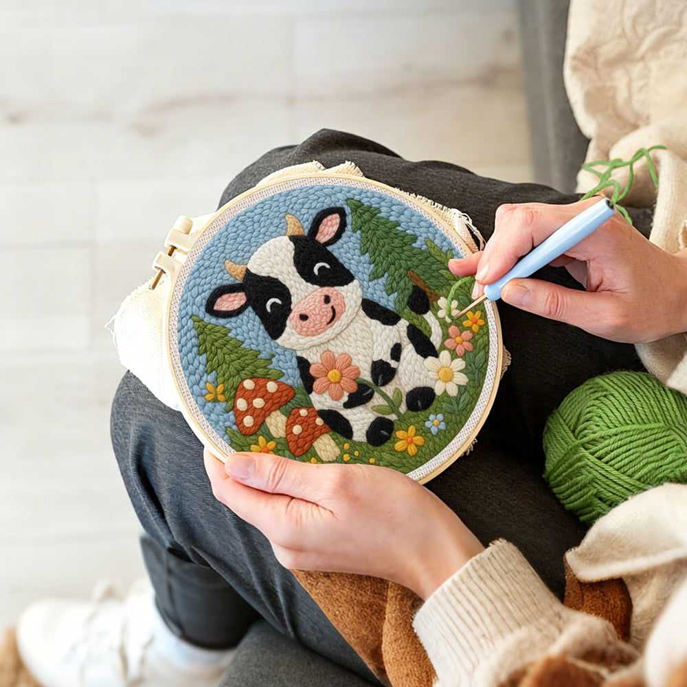 Creating handmade cow in the meadow and flower forest punch needle artwork