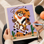 Creating handmade cowboy ghost riding horse punch needle artwork