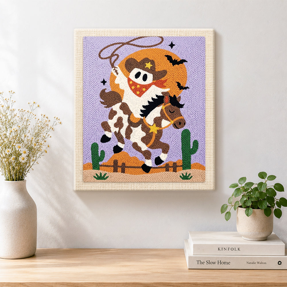 Finished cowboy ghost riding horse artwork displayed on a wall