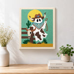 Finished cowboy ghost with lasso artwork displayed on a wall