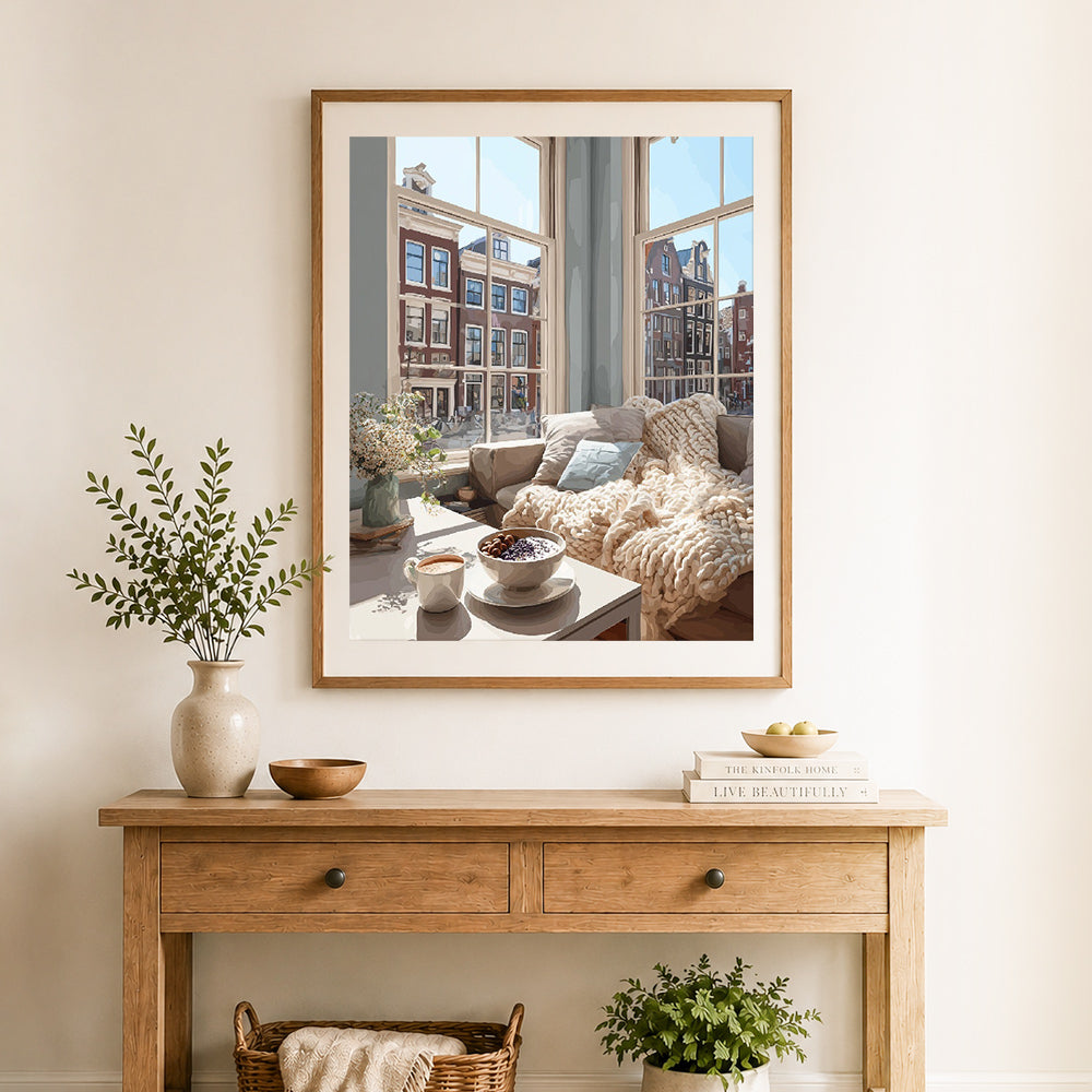 Finished cozy amsterdam window cross stitch artwork displayed as home decor