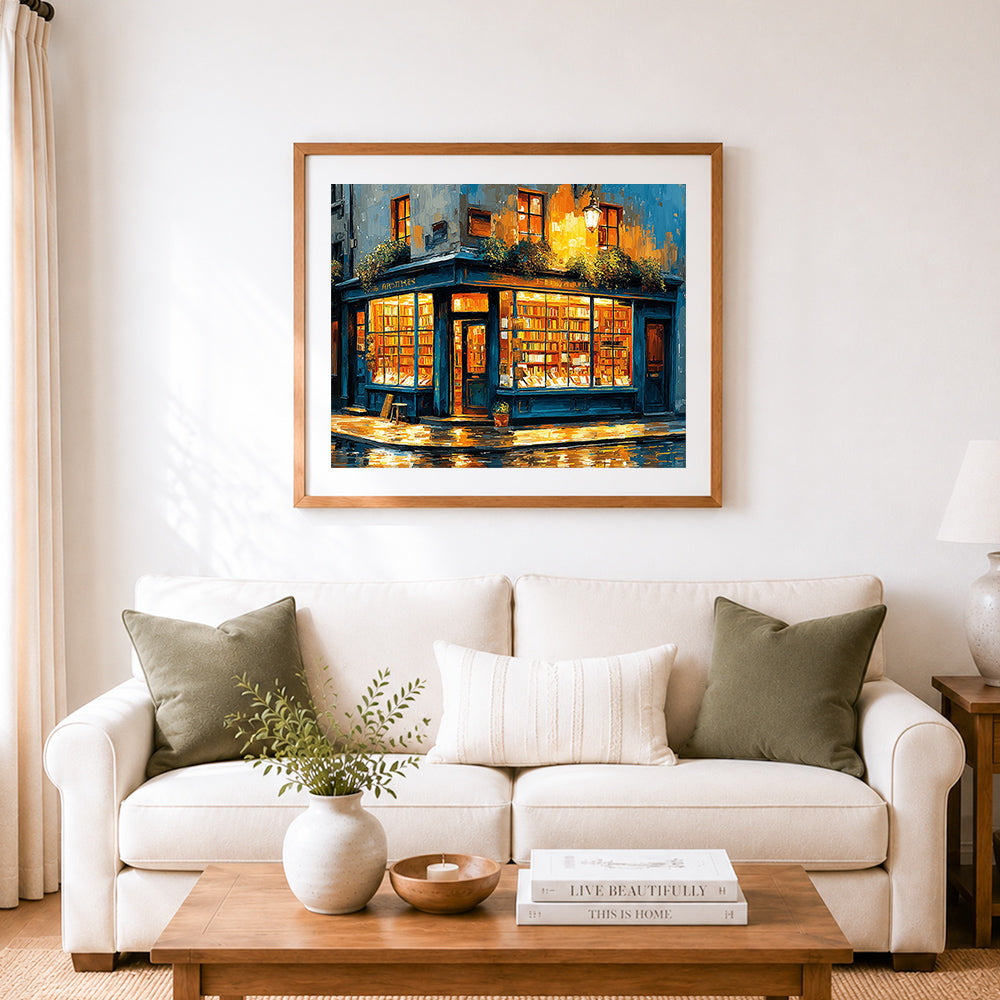 Finished cozy bookstore with warm glowing windows cross stitch artwork displayed as home decor