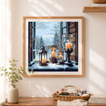 Finished cozy candles in snowy window cross stitch artwork displayed as home decor