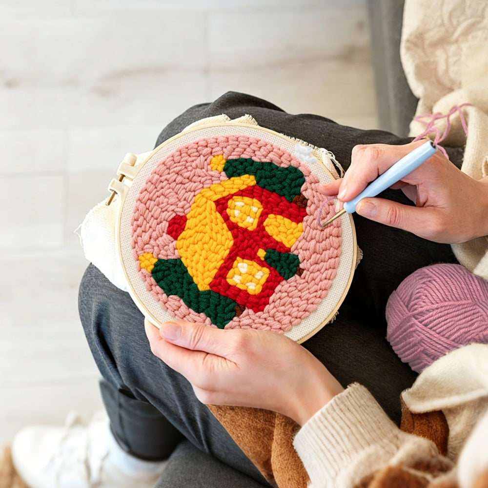 Creating handmade cozy christmas cabin unch needle artwork
