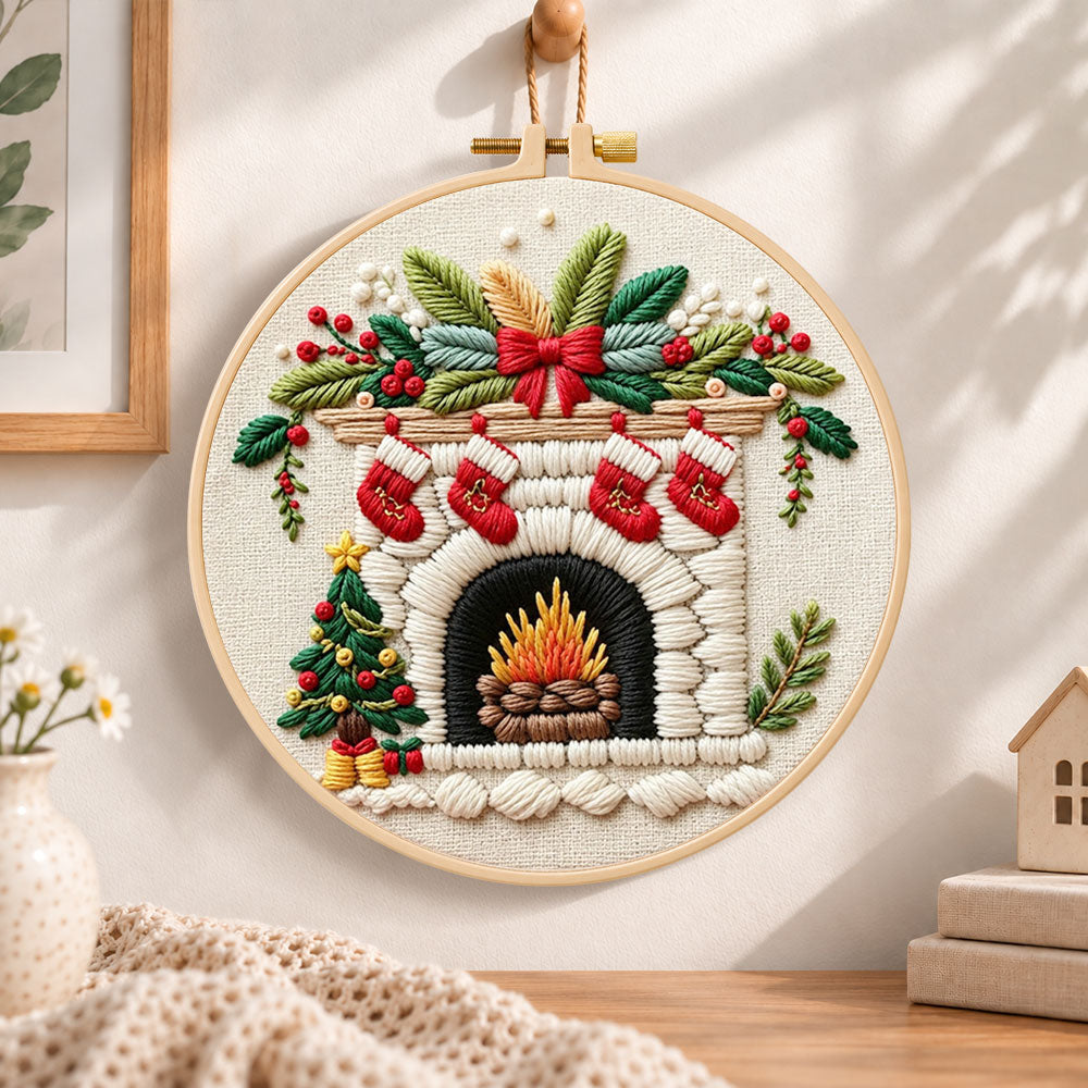 Cozy christmas fireplace embroidery hoop wall art displayed as warm and cozy handmade home decor