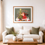 Finished cozy christmas hug cross stitch artwork displayed as home decor