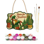 Cozy christmas retreat paint by numbers door hanger with paints and brushes