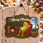 Cozy fireplace frog paint by numbers door hanger on a garden gate