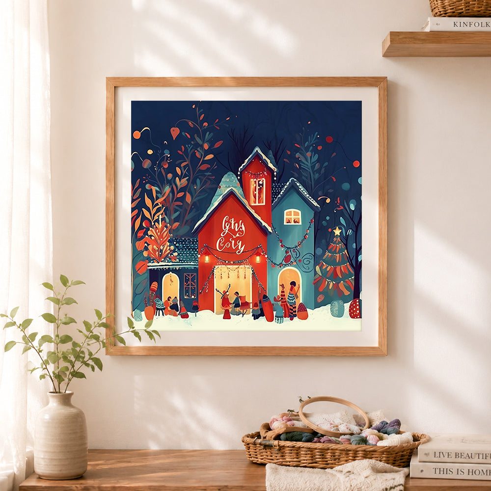 Finished cozy holiday village cross stitch artwork displayed as home decor