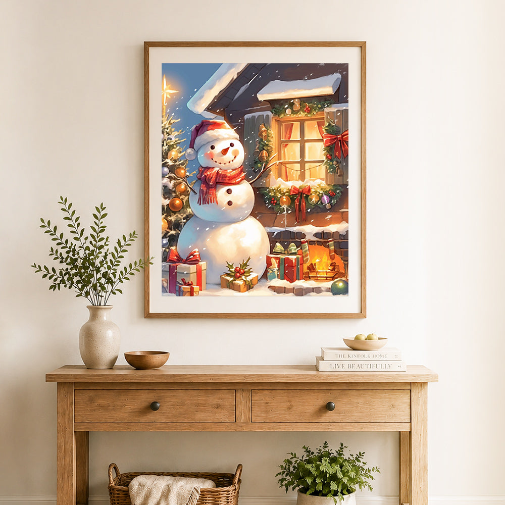 Finished cozy winter snowman scene cross stitch artwork displayed as home decor