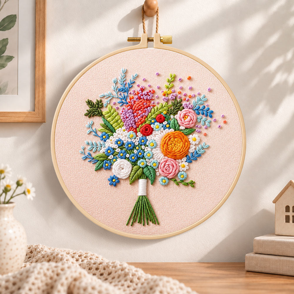 Cream wildflower bouquet embroidery hoop wall art displayed as warm and cozy handmade home decor