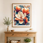 Finished creamy magnolia blooms cross stitch artwork displayed as home decor