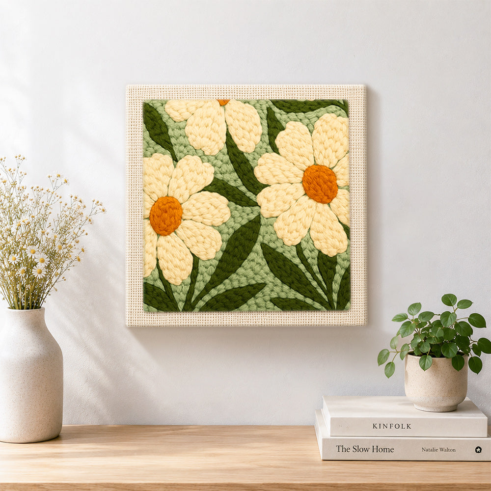 Finished creamy white daisy flowers artwork displayed on a wall