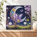 Finished crescent moon and purple butterfly pearl diamond painting artwork displayed as holiday home decor