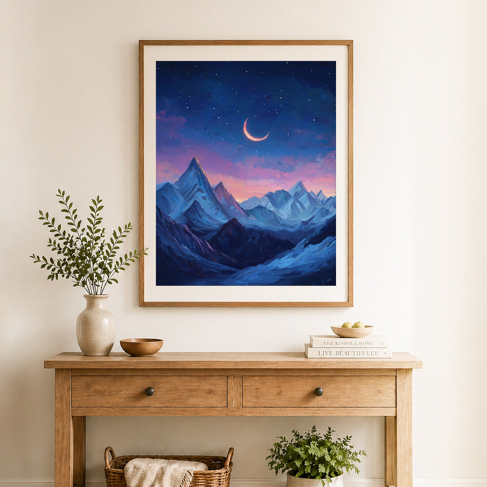 Finished crescent moon over snow peaks cross stitch artwork displayed as home decor