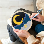 Creating handmade crescent moon, sea and mountains punch needle artwork