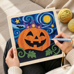 Creating handmade crown pumpkin in starry night punch needle artwork
