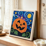 Crown pumpkin in starry night punch needle artwork displayed on a table