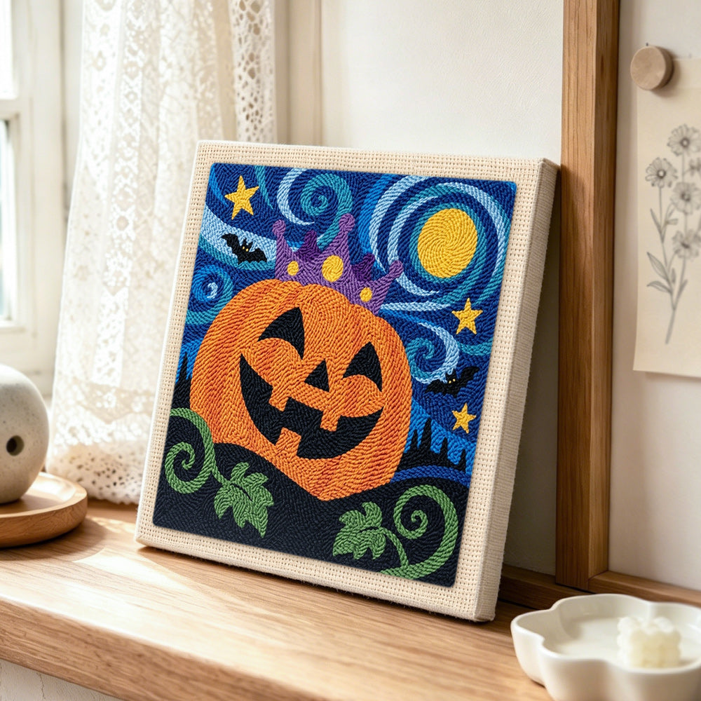 Crown pumpkin in starry night punch needle artwork displayed on a table