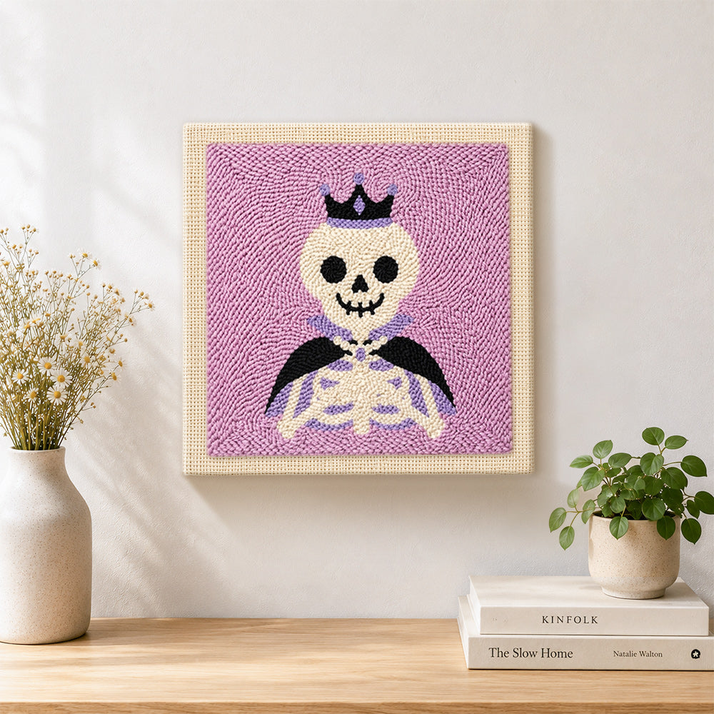 Finished crown skeleton artwork displayed on a wall