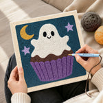 Creating handmade cupcake ghost punch needle artwork