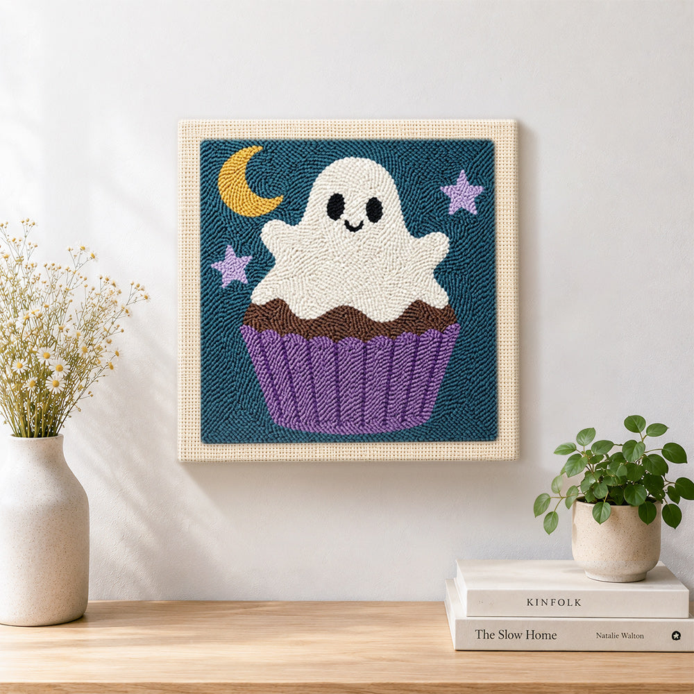 Finished cupcake ghost artwork displayed on a wall