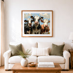Finished curious three cows cross stitch artwork displayed as home decor