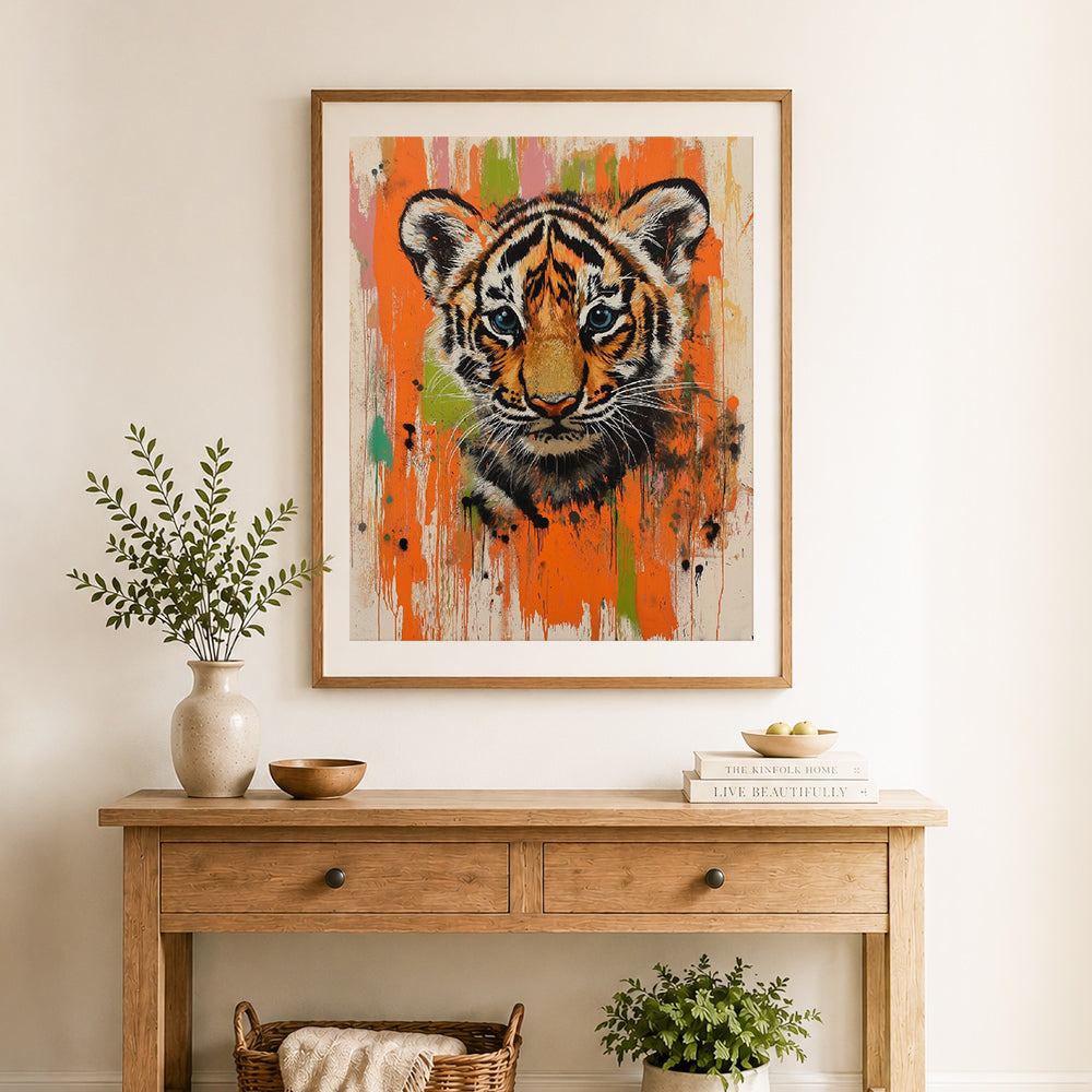 Finished cute baby tiger cub cross stitch artwork displayed as home decor