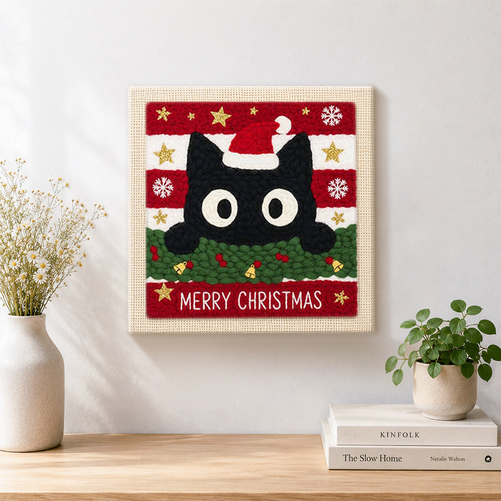 Finished cute black cat christmas portrait artwork displayed on a wall