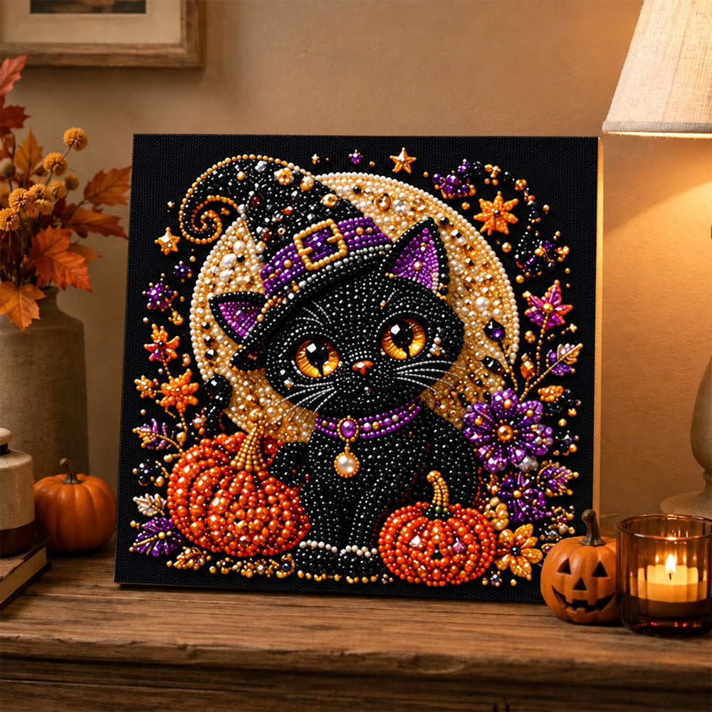 Finished cute black witch cat pearl diamond painting artwork displayed as holiday home decor