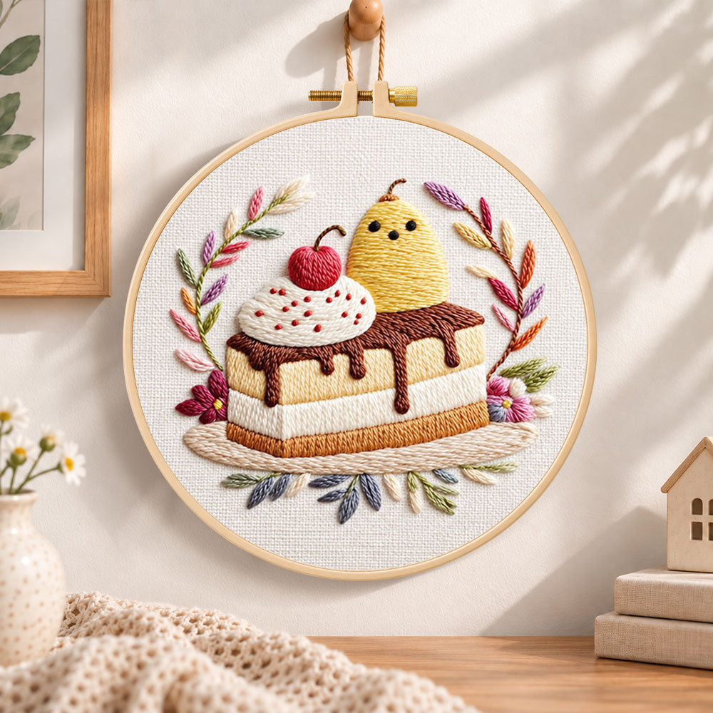 Cute cake art embroidery hoop wall art displayed as warm and cozy handmade home decor