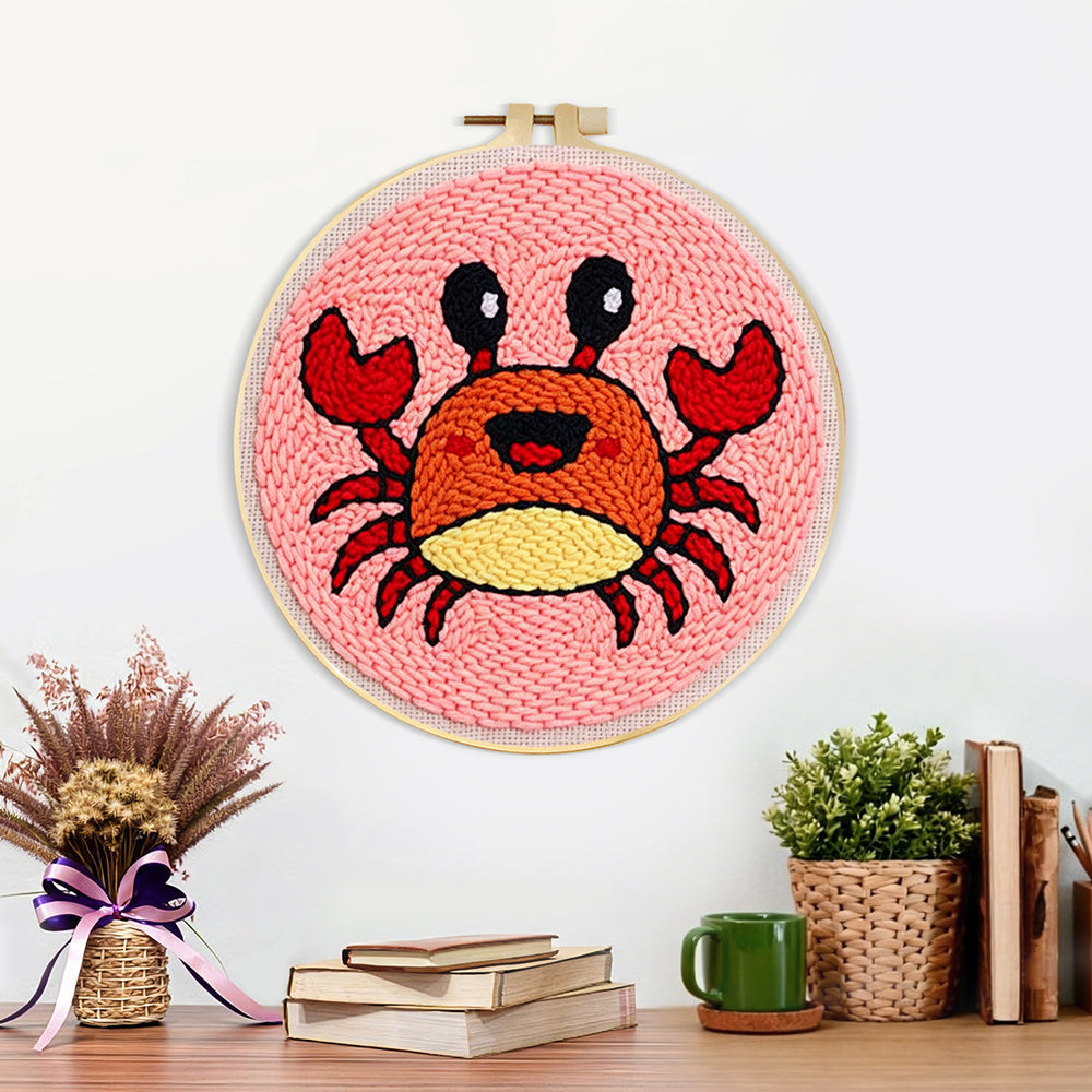 Finished cute cartoon crab artwork displayed on a wall