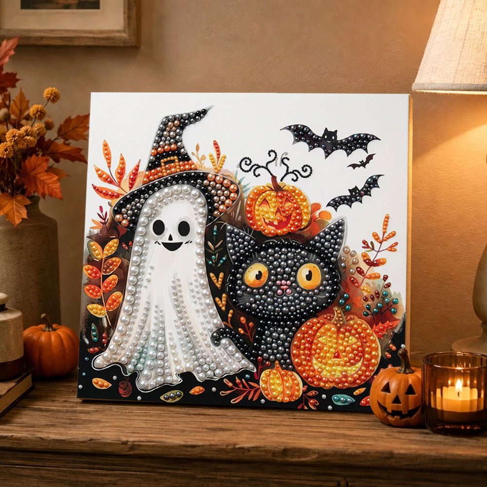 Finished cute ghost and black cat pearl diamond painting artwork displayed as holiday home decor