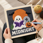 Creating handmade cute ghost reading at midnight punch needle artwork