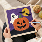 Creating handmade cute ghost with jack‑o‑lantern punch needle artwork