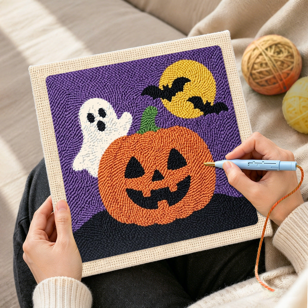 Creating handmade cute ghost with jack‑o‑lantern punch needle artwork