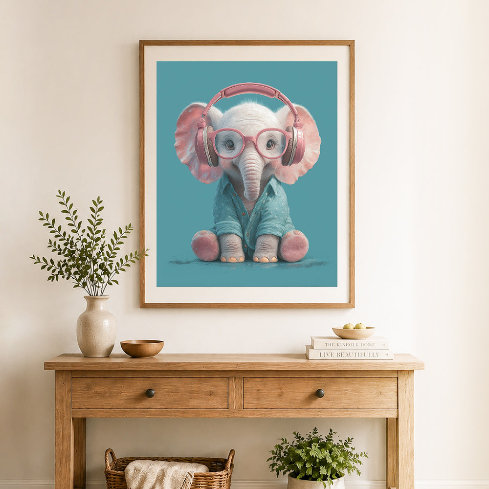 Finished cute hip baby elephant cross stitch artwork displayed as home decor