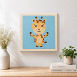 Finished cute open-arms giraffe artwork displayed on a wall