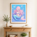 Finished cute pink‑haired mermaid cross stitch artwork displayed as home decor
