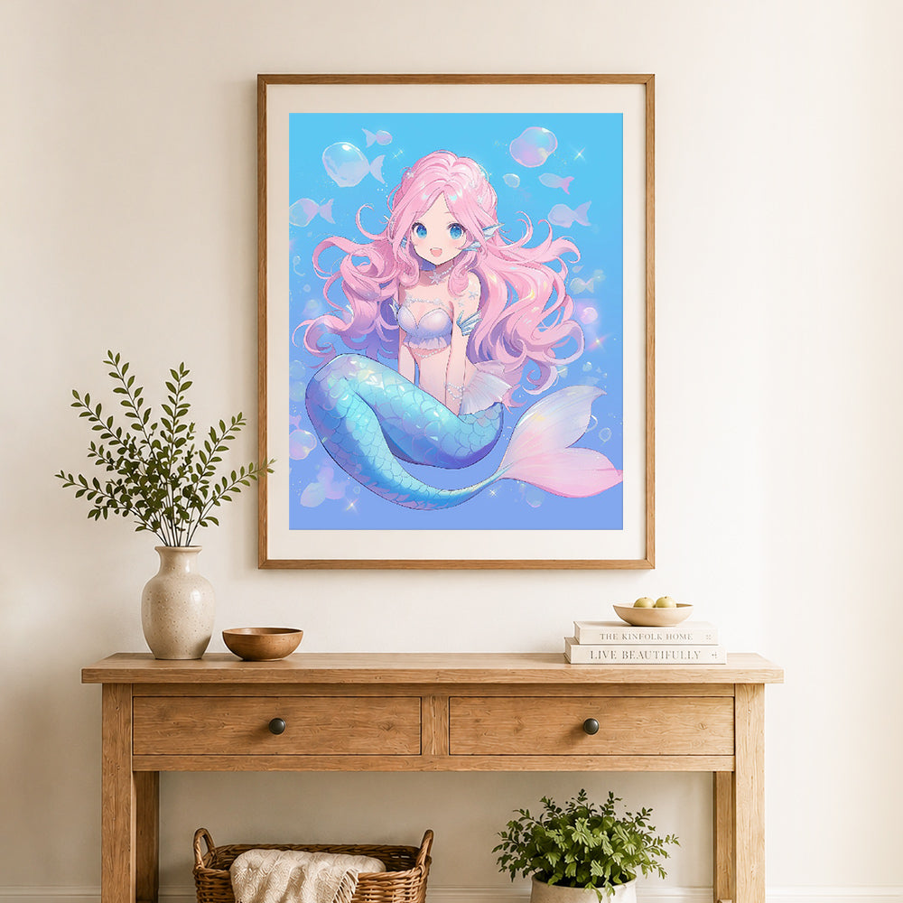Finished cute pink‑haired mermaid cross stitch artwork displayed as home decor