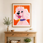 Finished cute pink poodle puppy cross stitch artwork displayed as home decor
