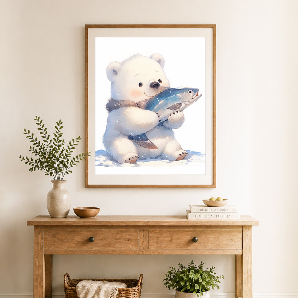 Finished cute polar bear with fish cross stitch artwork displayed as home decor