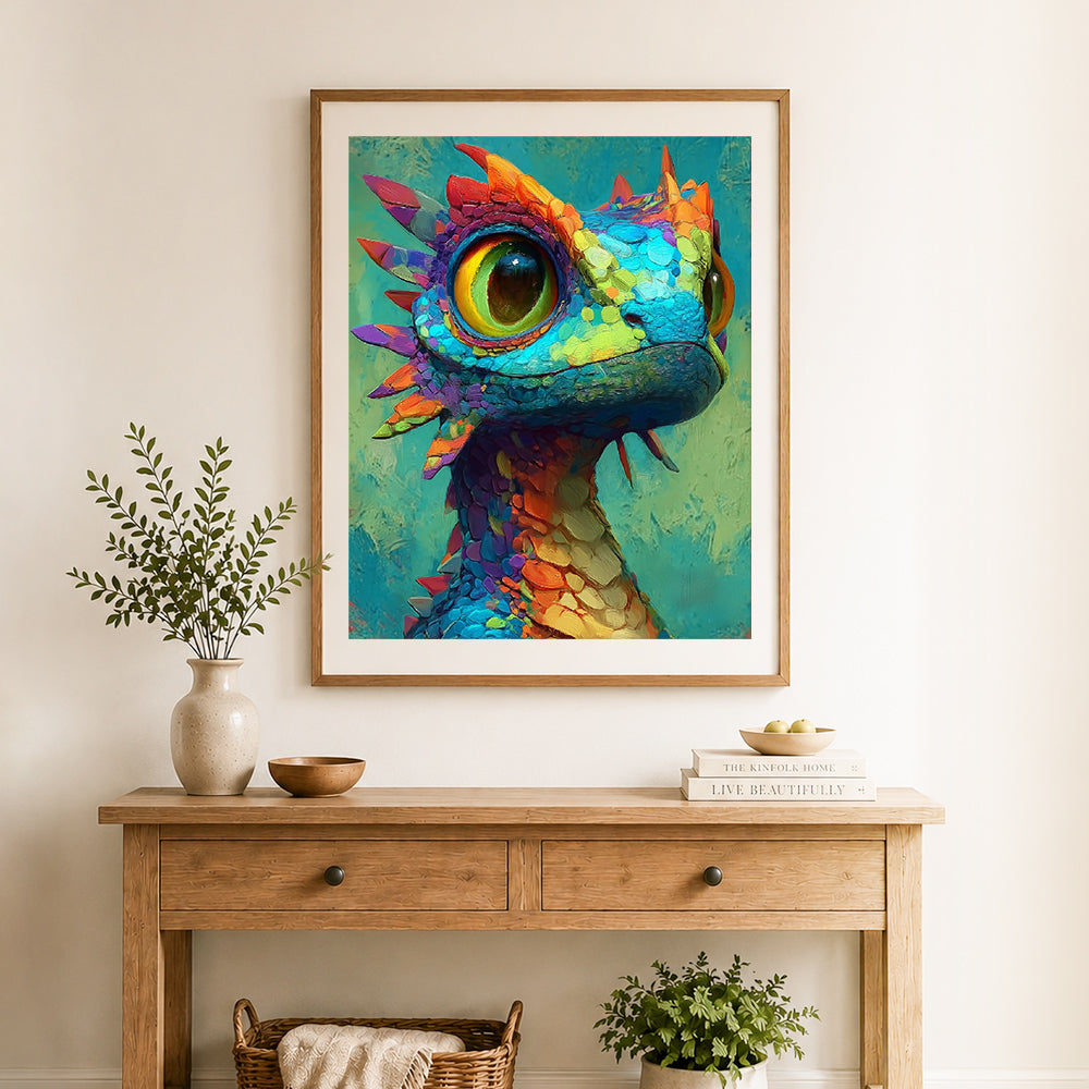 Finished cute rainbow baby dragon cross stitch artwork displayed as home decor