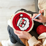 Creating handmade cute santa face unch needle artwork