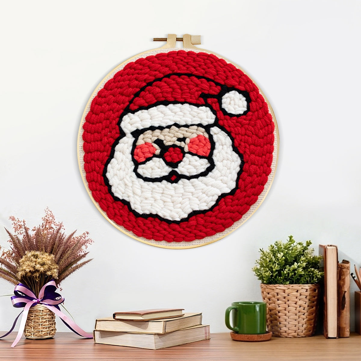 Finished cute santa face artwork displayed on a wall