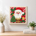 Finished cute santa portrait artwork displayed on a wall