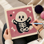 Creating handmade cute skeleton ghost punch needle artwork