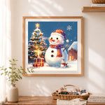 Finished cute snowman scene with xmas tree cross stitch artwork displayed as home decor
